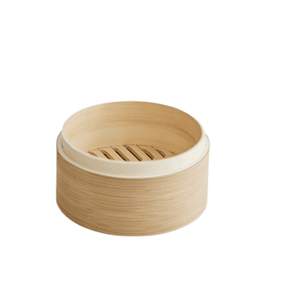 Bamboo steamer basket on a white background