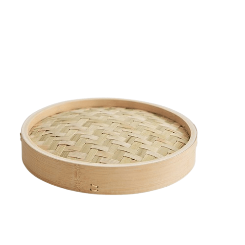 Bamboo steamer basket on a white background